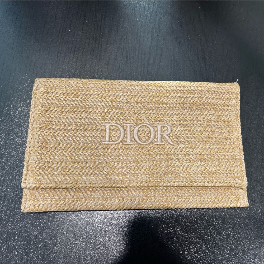 Dior raffia clutch